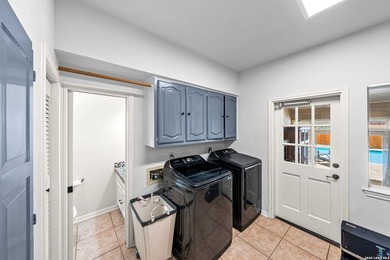 Set on a full acre in the exclusive gated community of Raintree - photo 31