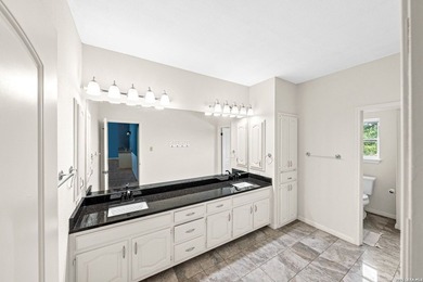 Set on a full acre in the exclusive gated community of Raintree - photo 33
