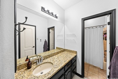 Set on a full acre in the exclusive gated community of Raintree - photo 37
