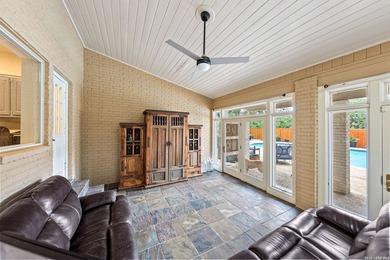 Set on a full acre in the exclusive gated community of Raintree - photo 43