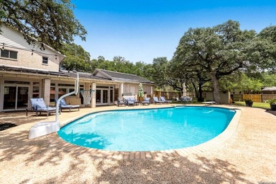 Set on a full acre in the exclusive gated community of Raintree - photo 48