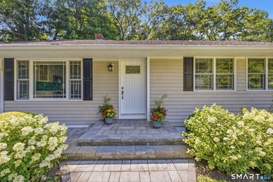 Welcome to this sun-drenched 3-bedroom, 2-bathroom ranch - photo 1