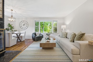 Welcome to this sun-drenched 3-bedroom, 2-bathroom ranch - photo 2
