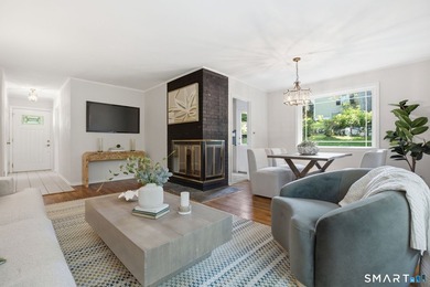 Welcome to this sun-drenched 3-bedroom, 2-bathroom ranch - photo 4
