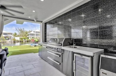 This Key Largo Lake front estate delivers a level of design and - photo 14