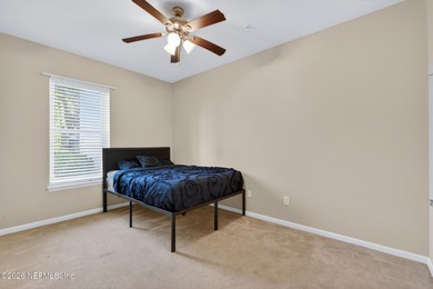 Welcome to this spacious and well-designed 3-bedroom, 2-bath