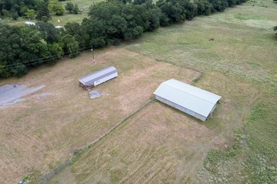 17.85 Acres with Pond, and an unfinished start of a house. This - photo 2