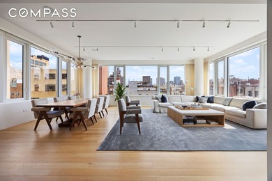 This full-floor, three-bedroom, three-and-a-half-bathroom loft - photo 1