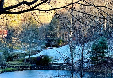 The beautiful Wolf Laurel gated community affords all the - photo 2