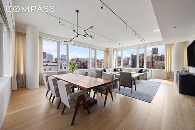This full-floor, three-bedroom, three-and-a-half-bathroom loft - photo 2