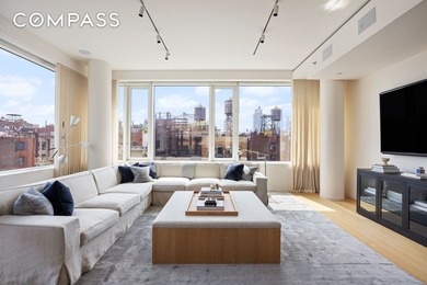This full-floor, three-bedroom, three-and-a-half-bathroom loft - photo 3
