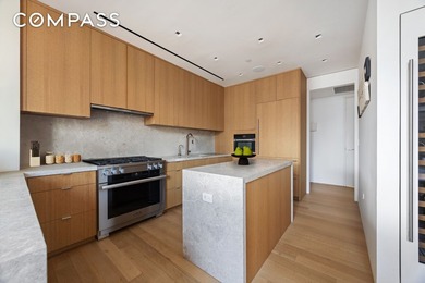 This full-floor, three-bedroom, three-and-a-half-bathroom loft - photo 5
