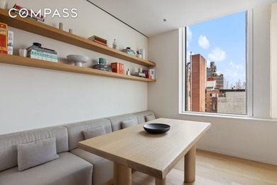 This full-floor, three-bedroom, three-and-a-half-bathroom loft - photo 6