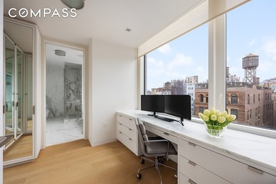 This full-floor, three-bedroom, three-and-a-half-bathroom loft - photo 9