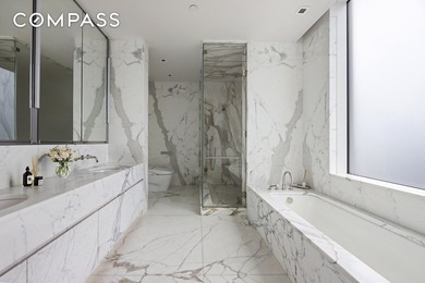 This full-floor, three-bedroom, three-and-a-half-bathroom loft - photo 10