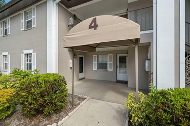 Virtually Staged. Welcome to Bay Oaks Condos! This first-floor - photo 1