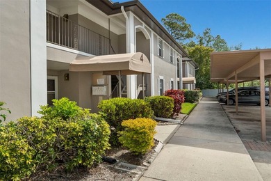 Virtually Staged. Welcome to Bay Oaks Condos! This first-floor - photo 2