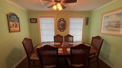 This unique 1-bedroom, 1-bath property sits on .44 acres shaded