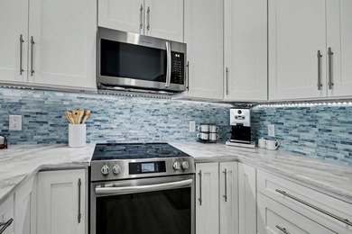 Experience coastal living in a beautifully updated home located - photo 12