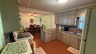 This unique 1-bedroom, 1-bath property sits on .44 acres shaded