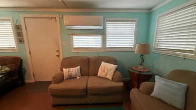 This unique 1-bedroom, 1-bath property sits on .44 acres shaded