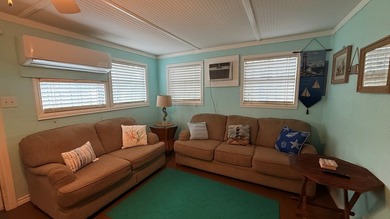 This unique 1-bedroom, 1-bath property sits on .44 acres shaded