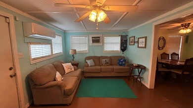 This unique 1-bedroom, 1-bath property sits on .44 acres shaded