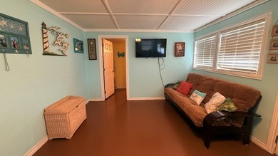 This unique 1-bedroom, 1-bath property sits on .44 acres shaded