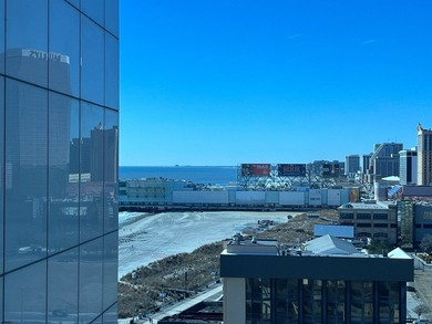 Bright and airy 1-bedroom condo in a high-rise, featuring - photo 3