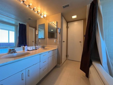 Bright and airy 1-bedroom condo in a high-rise, featuring - photo 8