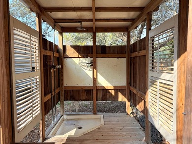 This unique 1-bedroom, 1-bath property sits on .44 acres shaded