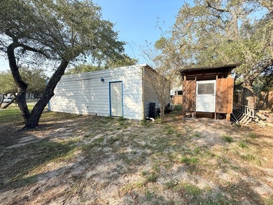 This unique 1-bedroom, 1-bath property sits on .44 acres shaded