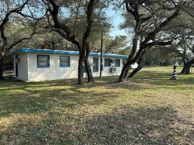 This unique 1-bedroom, 1-bath property sits on .44 acres shaded