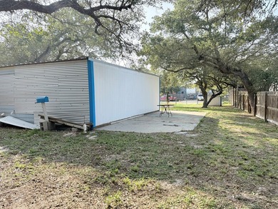 This unique 1-bedroom, 1-bath property sits on .44 acres shaded
