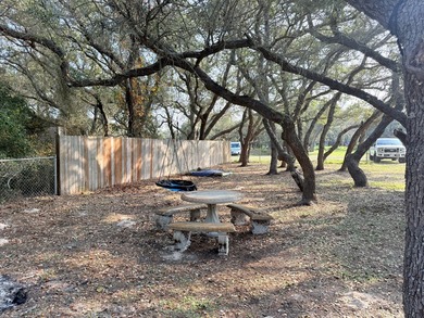 This unique 1-bedroom, 1-bath property sits on .44 acres shaded