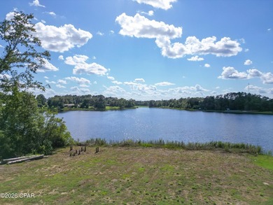 Desirable waterfront lot located on the larger lake in the - photo 1