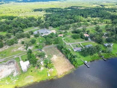 Desirable waterfront lot located on the larger lake in the - photo 9