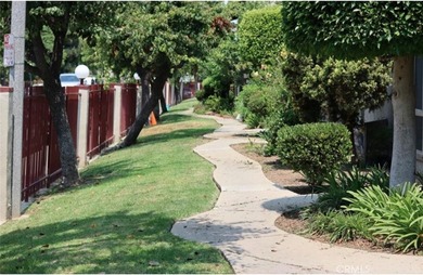 Welcome to this South Bay townhome located in the - photo 3