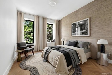 A fully renovated two-family townhouse spanning approximately 3 - photo 12