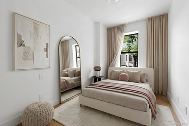 A fully renovated two-family townhouse spanning approximately 3 - photo 14