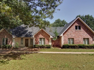 Look no further....this is the brick waterfront home at Lake - Lake Home Sale Pending in Yantis, Texas
