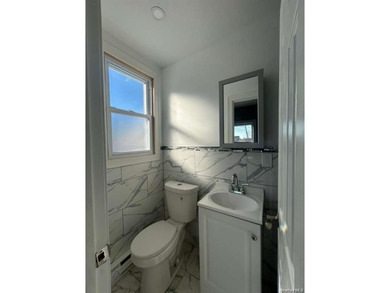 This amazing fully renovated house has on the 1st fl: 4 bedroom - photo 4