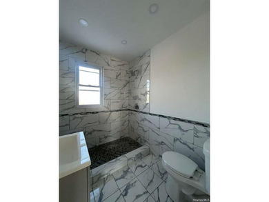 This amazing fully renovated house has on the 1st fl: 4 bedroom - photo 6