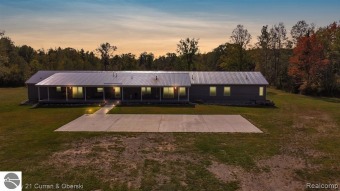 (private lake) Home For Sale in Harrison Michigan