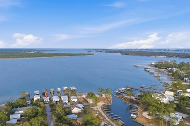 Experience the best of coastal living with this prime waterfront - photo 3