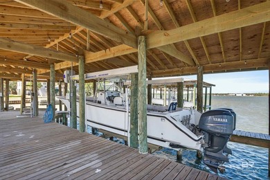 Experience the best of coastal living with this prime waterfront - photo 8