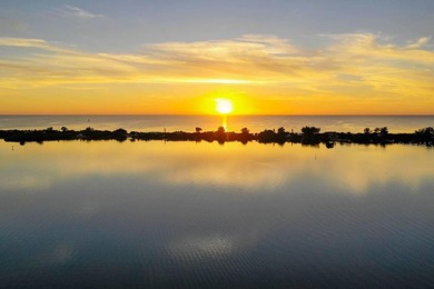 Enjoy sweeping water views and stunning sunsets over Little