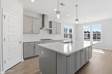 The single-story Bates II plan features three bedrooms and two - photo 4