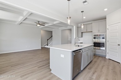 The single-story Bates II plan features three bedrooms and two - photo 6