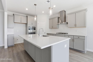 The single-story Bates II plan features three bedrooms and two - photo 7